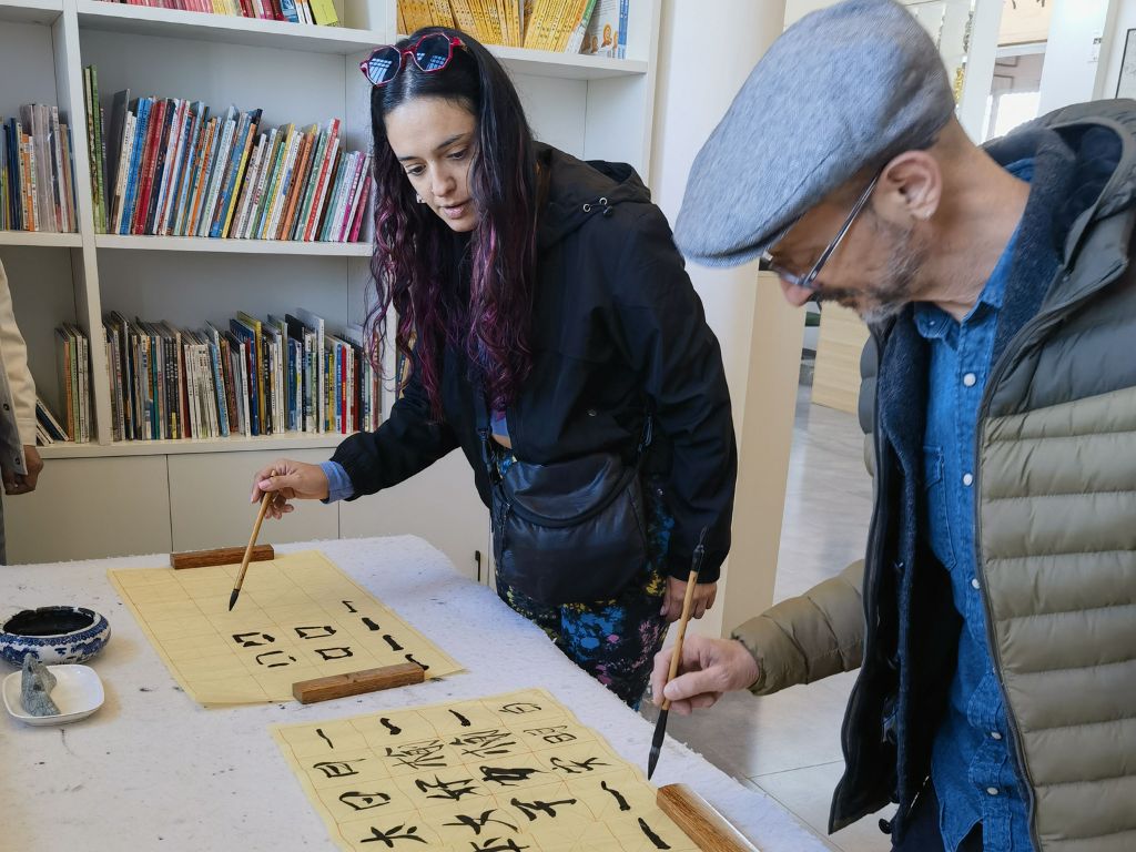Mariana dos Santos y Andrés Santángelo durante su estancia en China